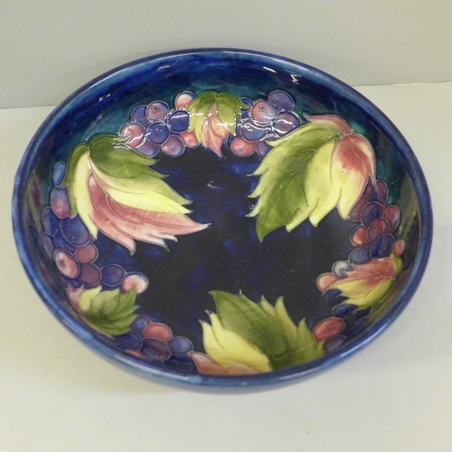 619 - A Moorcroft berry and leaf design bowl, circa 1935, signed, 22cm