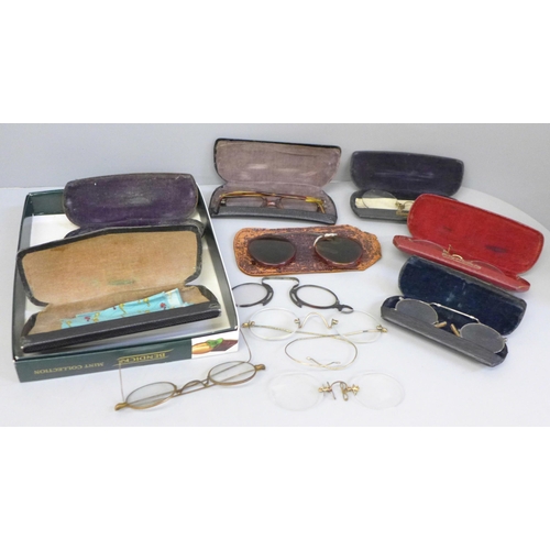 629 - Nine pairs of spectacles including pince-nez