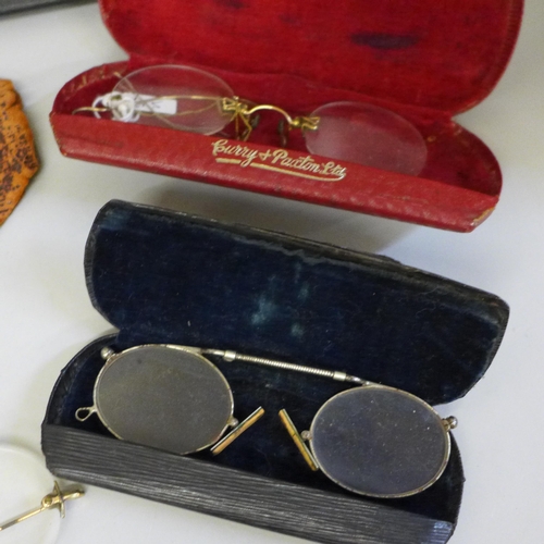 629 - Nine pairs of spectacles including pince-nez