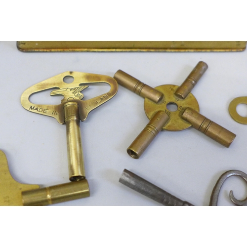 649 - A collection of over thirty clock and carriage clock keys