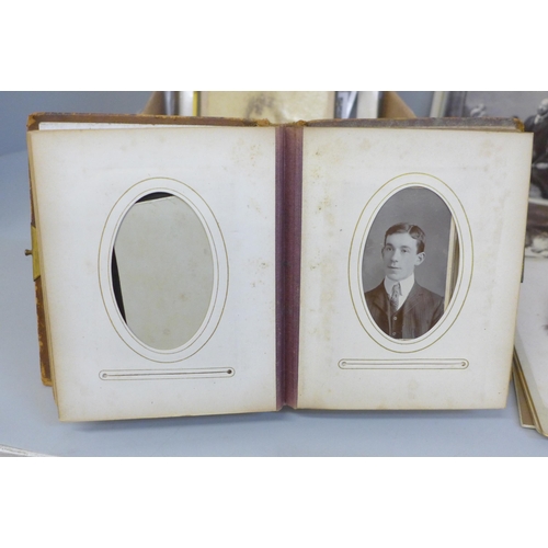 657 - A carte de visite album, cabinet cards and some loose photographs