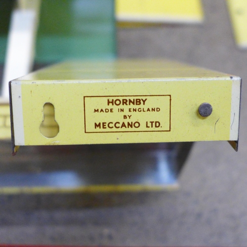 668 - A Hornby Island Platform, O gauge, boxed, two other Hornby buildilngs and platform and two Meccano p... 