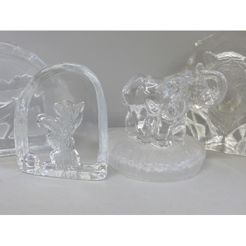 669 - A Swedish glass plaque, Nybro Sweden label and four glass animal paperweights