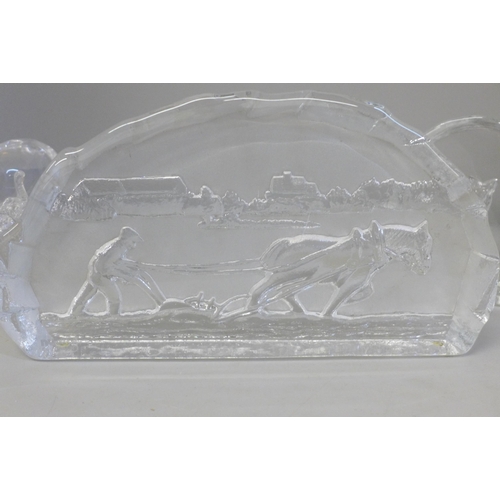 669 - A Swedish glass plaque, Nybro Sweden label and four glass animal paperweights