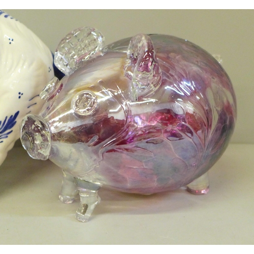 671 - A large hand painted Delft elephant, 37cm and a pink cased glass pig money box, 19cm