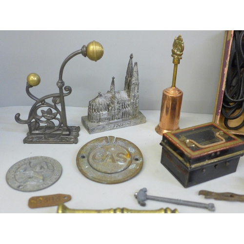 675 - Small metalwares including money boxes, a pair of Shakespeare nutcrackers, fishing lures, etc.