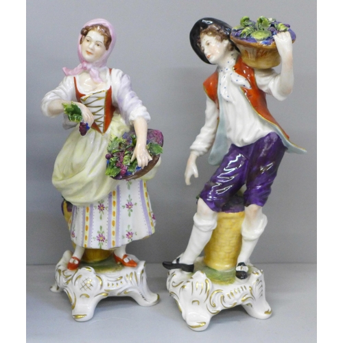 677 - A pair of Staffordshire figures, sheep shearer and companion and two Continental figures, small loss... 