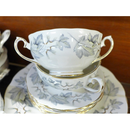 680 - A Royal Albert Silver Maple eight setting dinner service, two tureens, six soup bowls (one a/f) and ... 