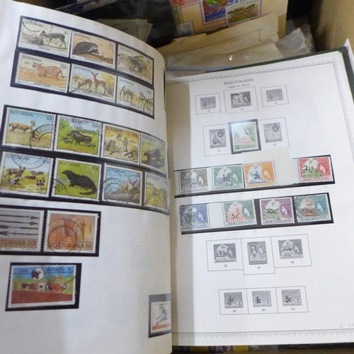 708 - Stamps; a box of stamps, covers, etc., loose and in albums