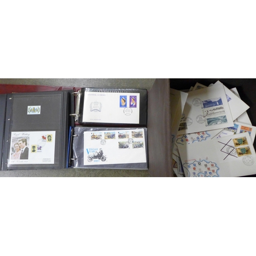 711 - Stamps; a large box of first day covers, loose and in albums