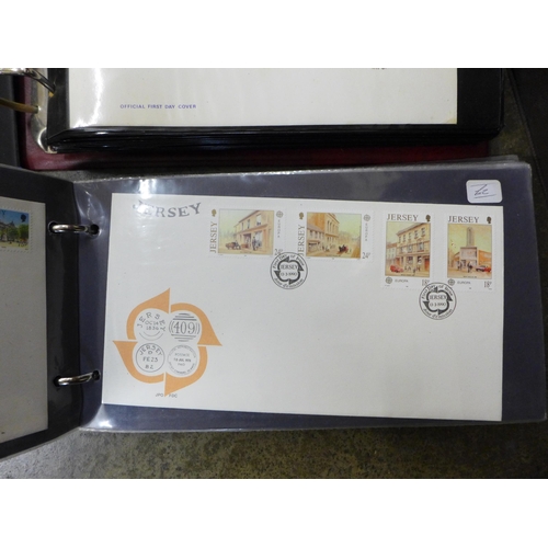 711 - Stamps; a large box of first day covers, loose and in albums