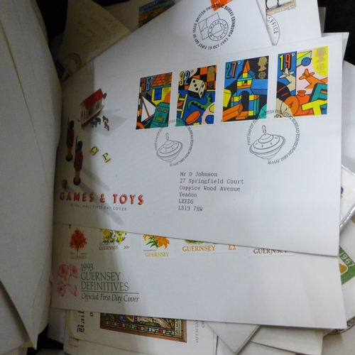 711 - Stamps; a large box of first day covers, loose and in albums