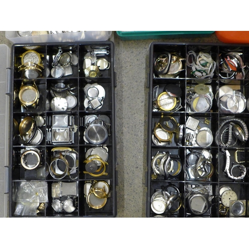 719 - A large collection of watch cases and case backs