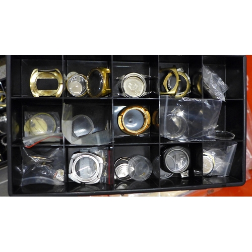 719 - A large collection of watch cases and case backs