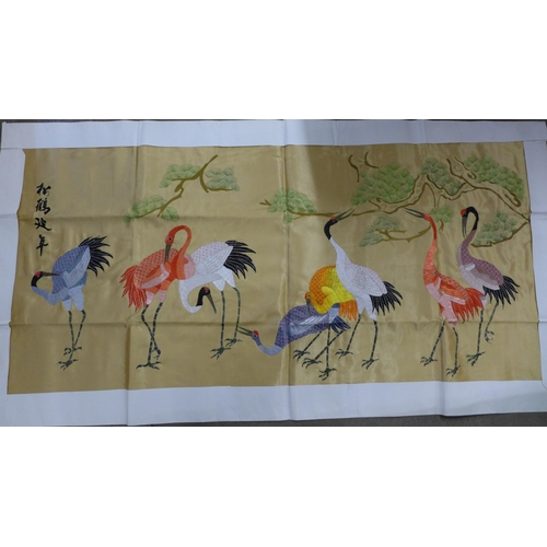 721 - A large Chinese embroidered silk wall hanging