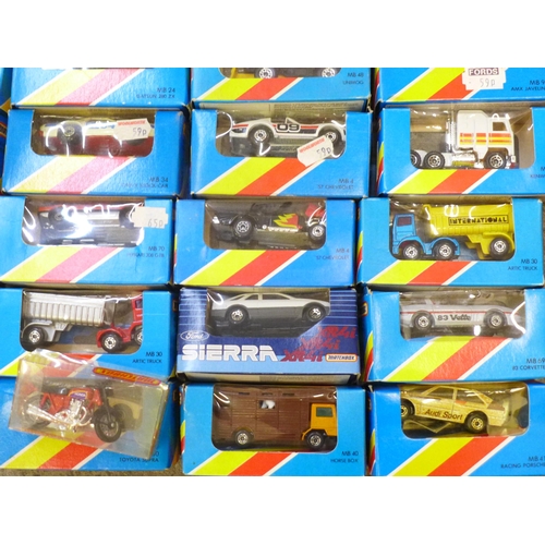 731 - A collection of twenty early 1980s carded Matchbox die-cast vehicles and four others, boxed