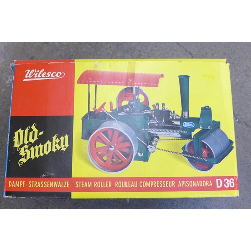 736 - A Wilesco West German Old Smoky D36 steam roller, a Czechoslovakia tractor and trailer vintage toy, ... 