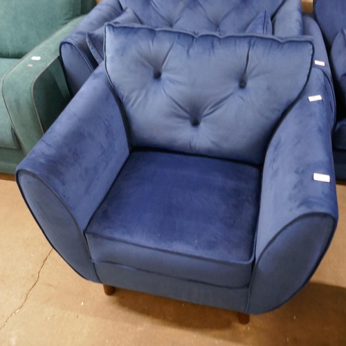 1415 - A Hoxton blue velvet armchair RRP £719