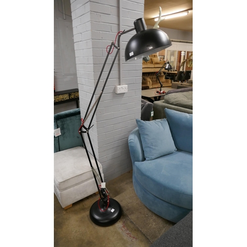 1451 - A black floor standing anglepoise lamp