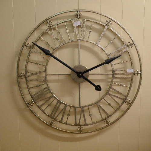 1344 - A silver skeleton wall clock, 70cm