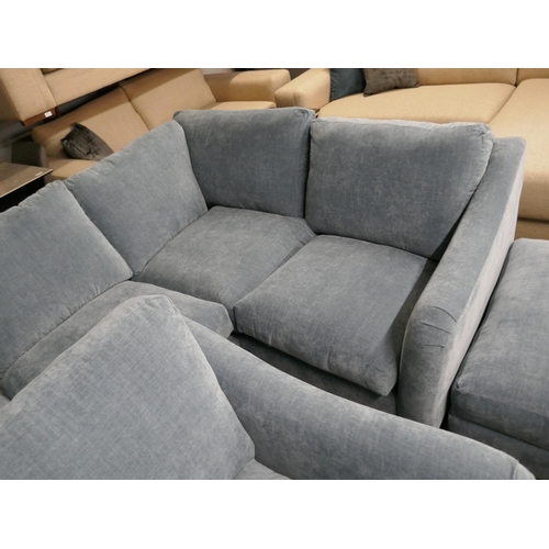 1397 - A Hattie Ansell aqua corner sofa, loveseat and storage footstool