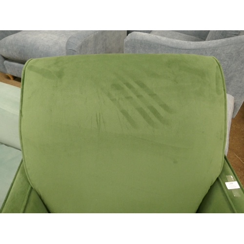 1398 - A green velvet accent chair