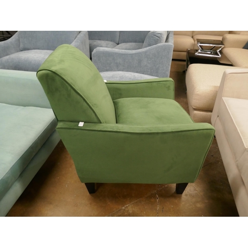 1398 - A green velvet accent chair