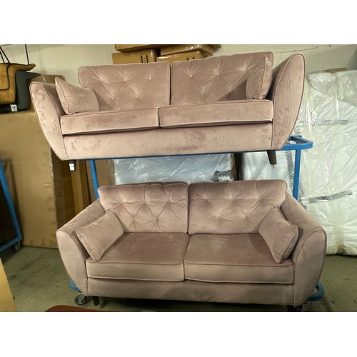 1530 - A pair of pink Hoxton three seater sofas - spare back cushion