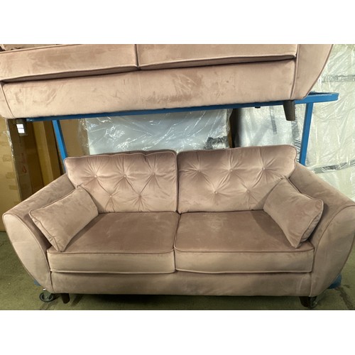 1530 - A pair of pink Hoxton three seater sofas - spare back cushion