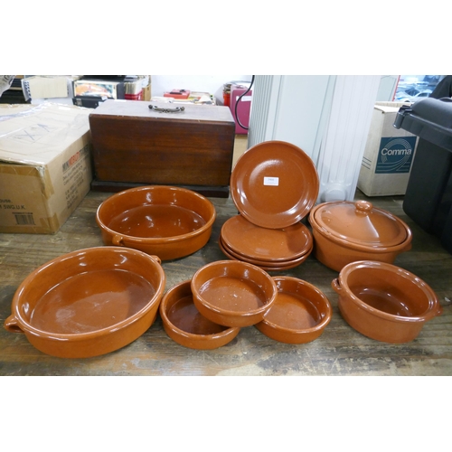 2466 - A collection of terracotta and Tappas cooking dishes