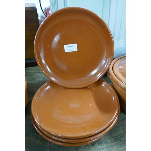 2466 - A collection of terracotta and Tappas cooking dishes