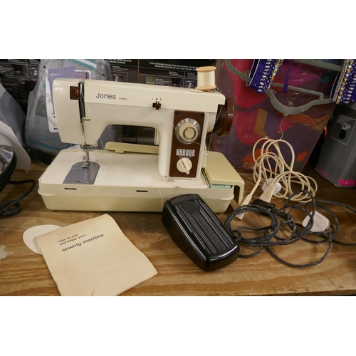 2495 - A Jones VX500 sewing machine including various sewing materials, accessories and foot pedal