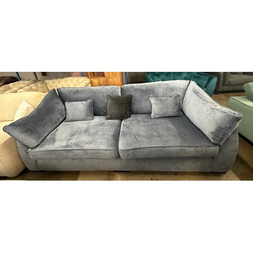 1435 - A Barker & Stonehouse blue velvet four seater sofa RRP £1439