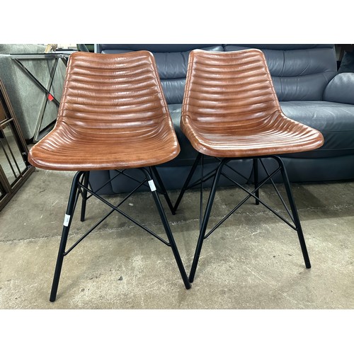 1458 - A pair of leather side chairs