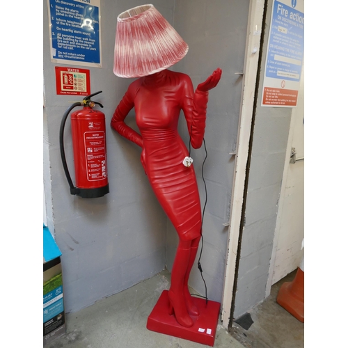 1570 - A red painted lady figure floor lamp