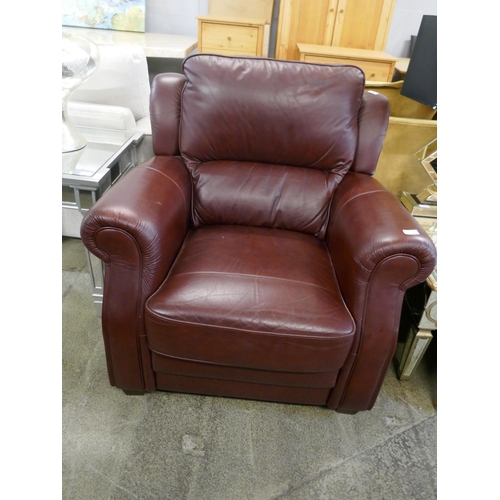 1605 - An oxblood leather armchair