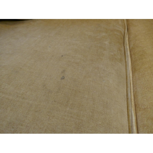 1615 - A turmeric velvet three seater sofa