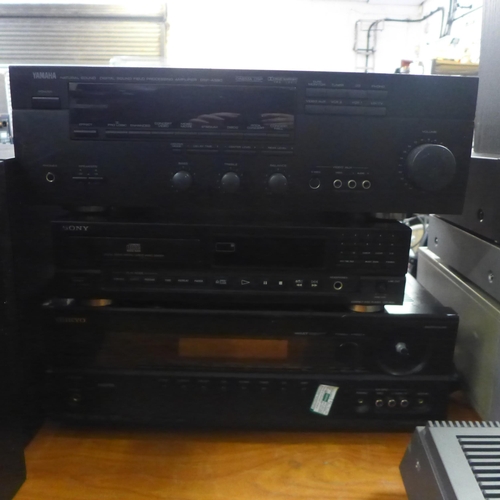 2192 - A Bush 9530 stereo system with an analogue semi-automatic turntable, AM-FM stero tuner, graphic equa... 