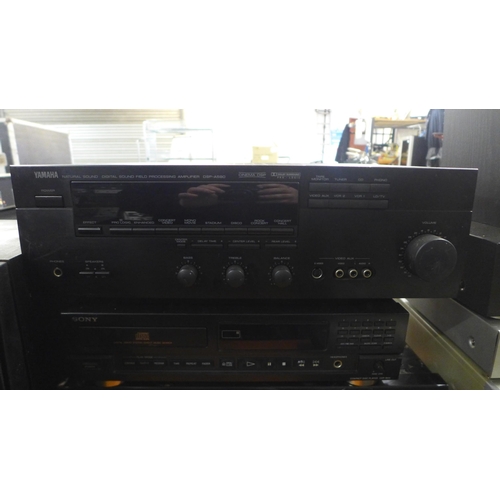 2192 - A Bush 9530 stereo system with an analogue semi-automatic turntable, AM-FM stero tuner, graphic equa... 