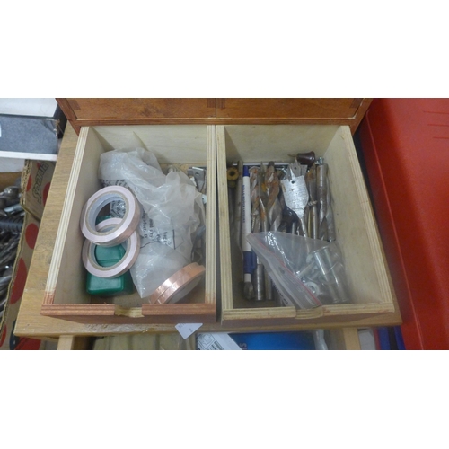 2002 - 2 Workshop drawers of consumables including chemical metal glue, automotive bulbs, Araldite adhesive... 