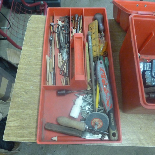 2025 - A red plastic toolbox and tools including drill bits, drop forged steel monkey wrench, spanners, han... 