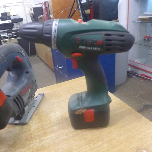 2029 - 3 Bosch power tools; PSR14.4 VE-2 cordless drill, 18v cordless jigsaw (GST18v) and 12v cordless dril... 