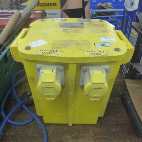 2058 - A 110v-230v double socket transformer