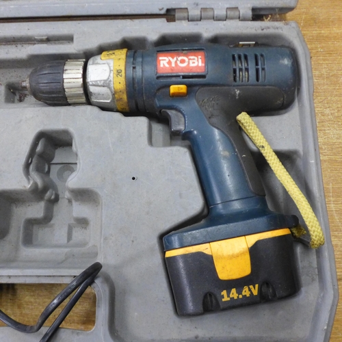 2083 - A Ryobi 14v drill (Model CD1-1441) and 2 batteries