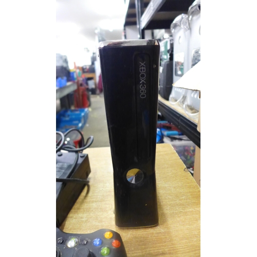 2091 - An Xbox 360 with one controller pad and power cable and an Xbox One with power cable - both black