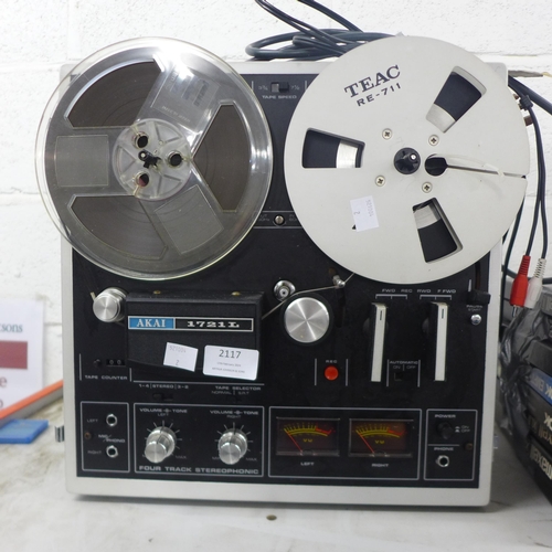 2117 - An Akai 1721L studio reel to reel recorder with Teac RE-711 aluminium coil/reel and an assortment of... 