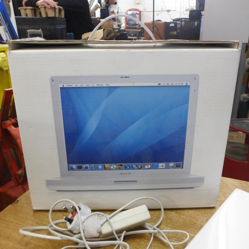 2121 - An Apple i Book G4 laptop with power cable and original box