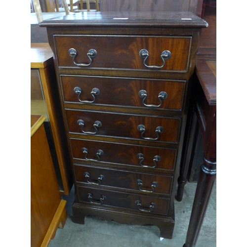 110 - A George III style mahogany chest of drawers