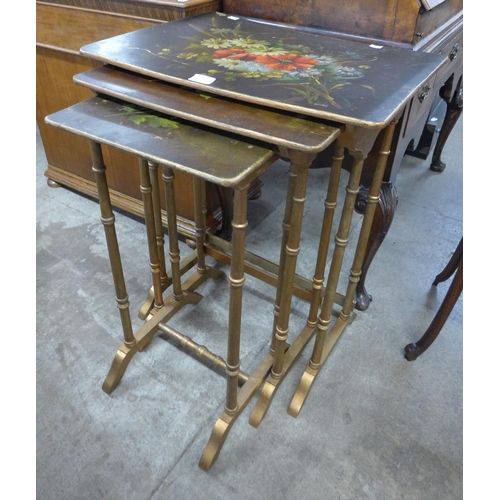 114 - A Regency style painted gilt nest of tables