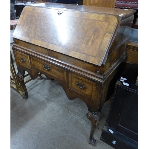 115 - A Queen Anne style walnut bureau de dame